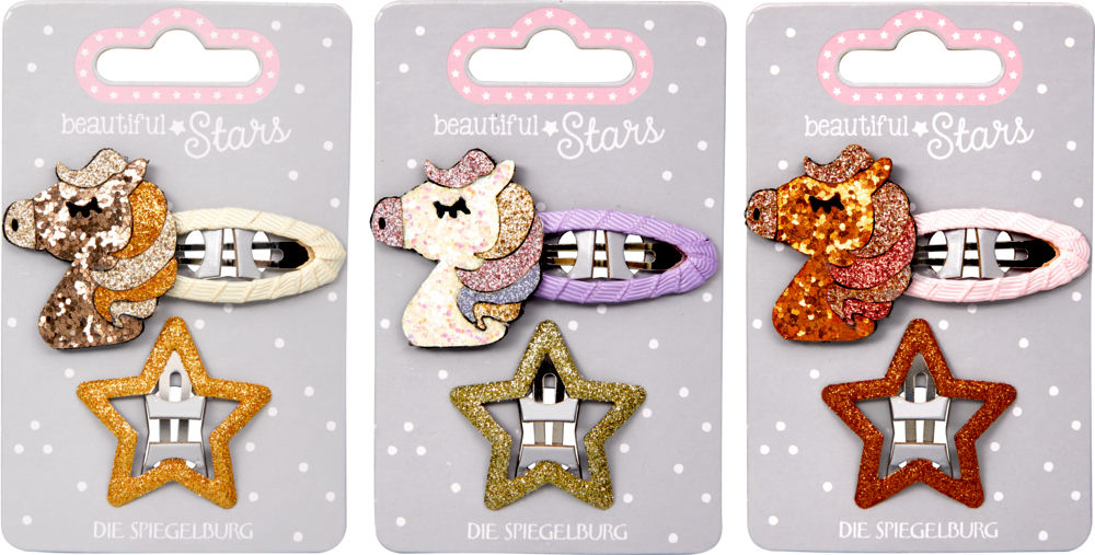 Haarclips Glitzerpferde no.3 - beautiful Stars Set mit 3 Einhorn- und Stern-Haarspangen in Gold, Lila und Pink auf dekorativer Verpackung.