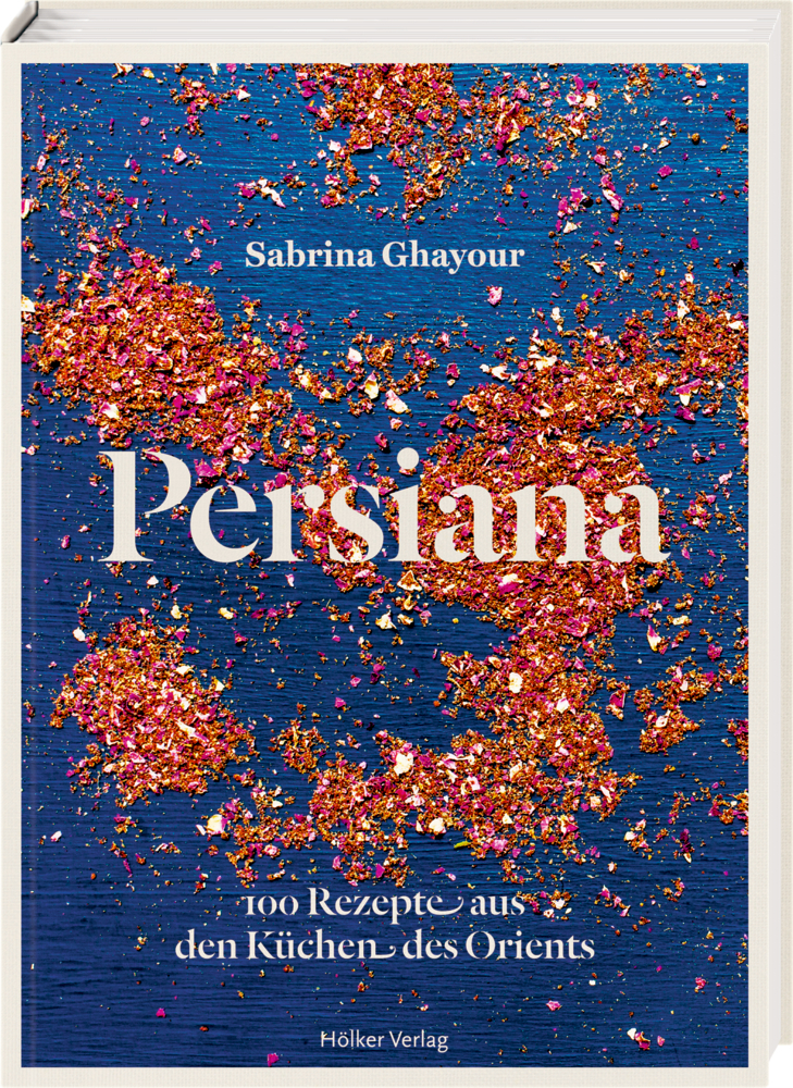 Persiana - 100 Rezepte aus den Küchen des Orients Persiana von Sabrina Ghayour: Das Buchcover zeigt ein rosa und goldenes Glitzerdesign auf blauem Hintergrund.