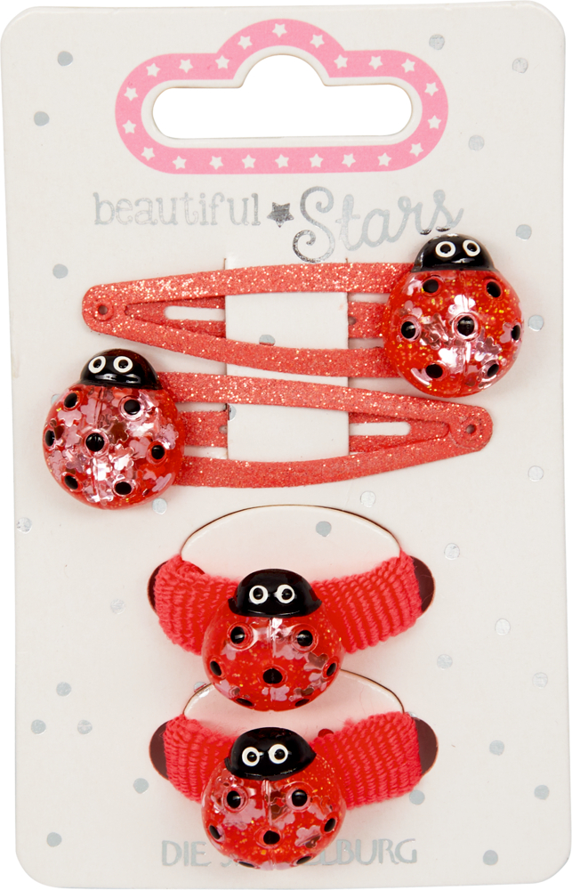 Rote Glitzer-Haarspangen und -bänder mit niedlichen Marienkäfer-Motiven auf einer „Beautiful Stars“-Karte.