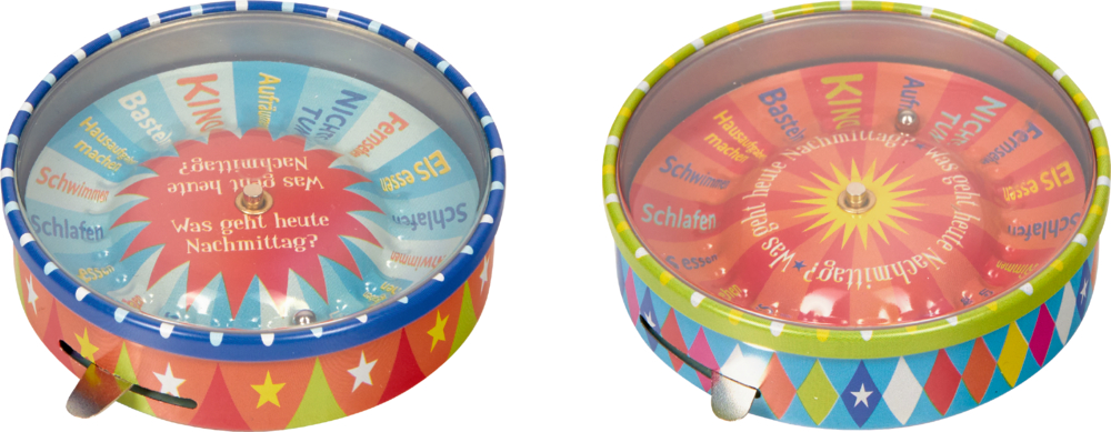 Mini-Roulette Entscheidungshelfer - Bunte Geschenke Zwei bunte Glücksräder aus Metall weisen auf ihrer Oberfläche einen Text und ein Sternenmuster auf.
