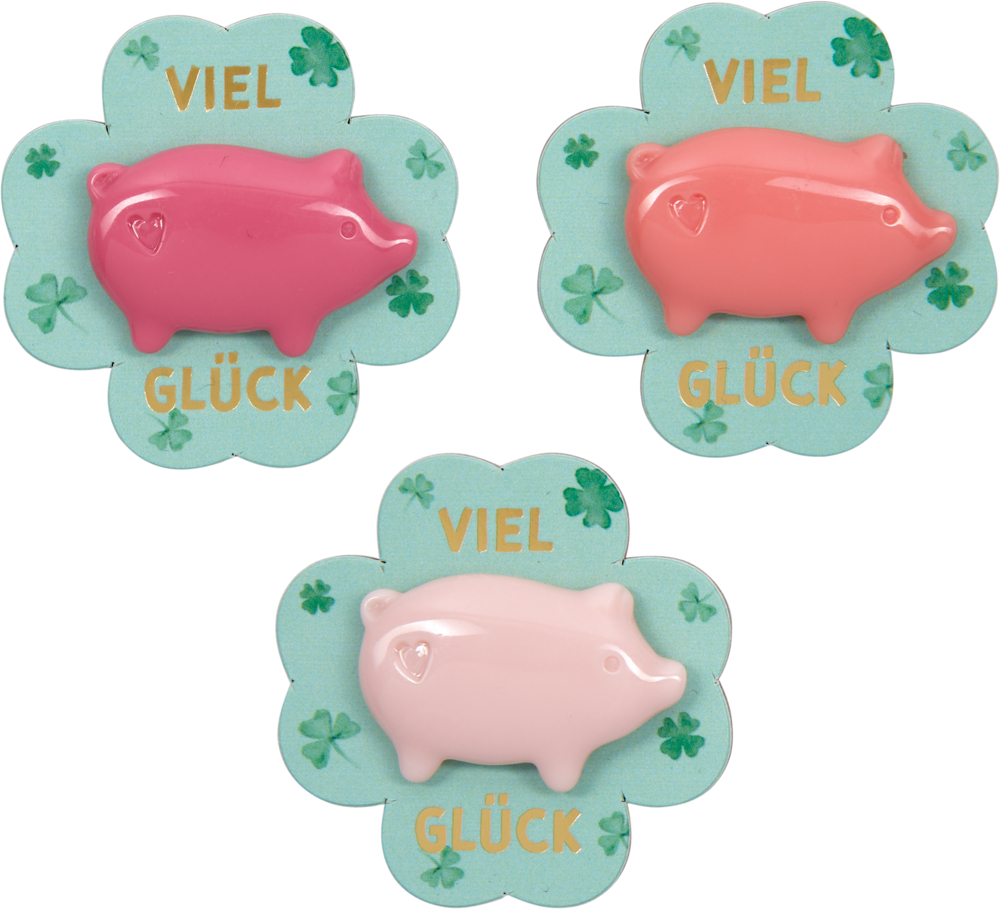 Drei Glücksschweinchen in Pink, Koralle und Hellrosa auf vierblättrigen Kleeblättern mit dem Text „Viel Glück“.