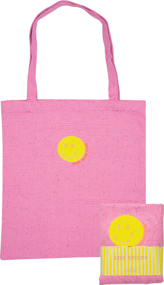 Pinkfarbene Tragetasche mit gelbem Smiley und der Aufschrift KEEP SMILING auf der Verpackung.