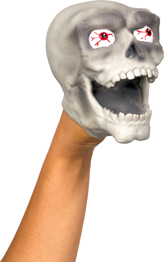 Eine Handpuppe in Form eines Totenkopfes mit weit geöffnetem Mund und hervorquellenden, blutunterlaufenen Augen.