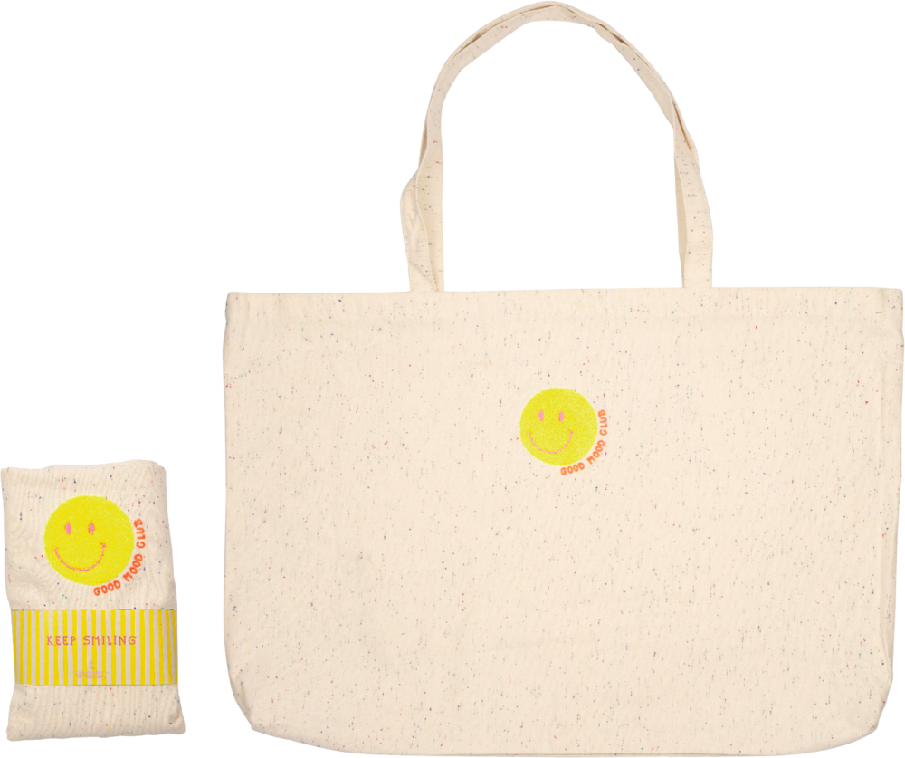Beiger Shopper mit gelbem Smiley und GOOD FOR US Text, daneben die zusammengefaltete Variante.