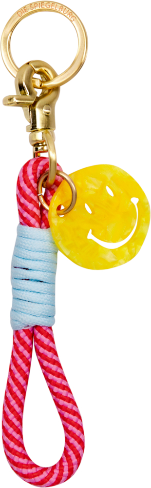 Schlüsselanhänger mit goldfarbenem Verschluss, pink-rosa Kordel, blauem Wickel und gelbem Smiley-Anhänger.