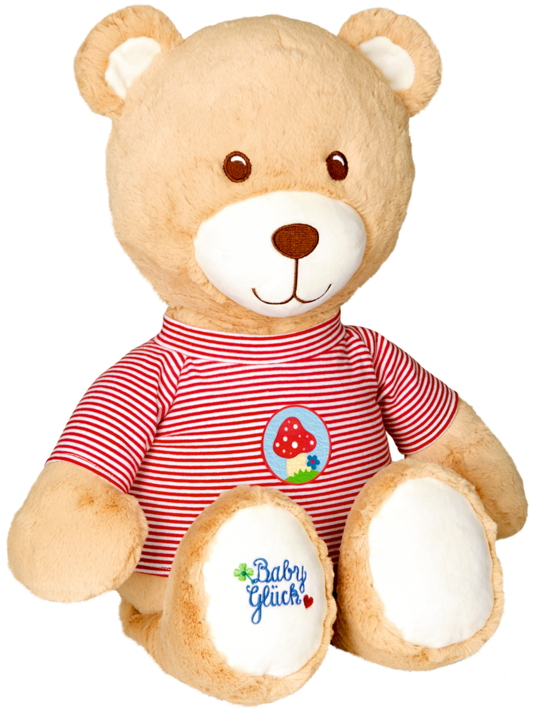Sitzender Plüschteddybär im rot gestreiften Shirt mit Pilz-Aufnäher, auf dem Fuß ist „Baby Glück“ gestickt.
