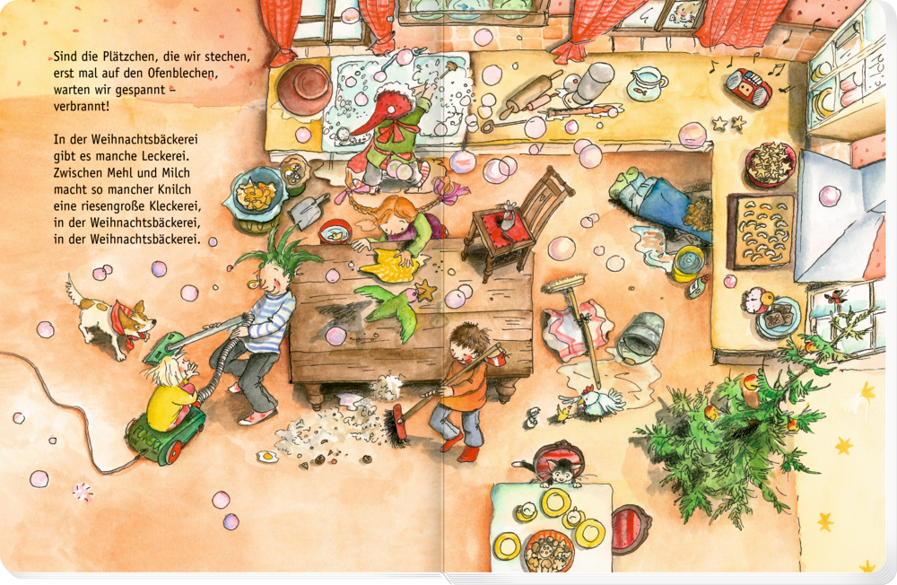 Buchinnenansicht mit Kindern, die backen und Kekse in einer chaotischen Küche voller Leckereien und Weihnachtsdekorationen verzieren.