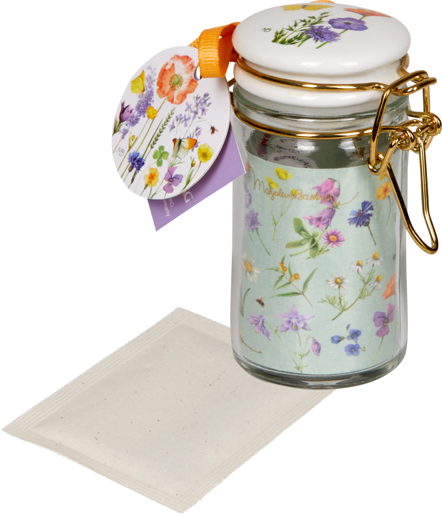 Saatgut (Bienenblumen-Mischung) GartenLiebe - M. Bastin Kleines Glasgefäß mit Blumenmuster, orangefarbener Schleife, weißem Deckel und Schnappverschluss.