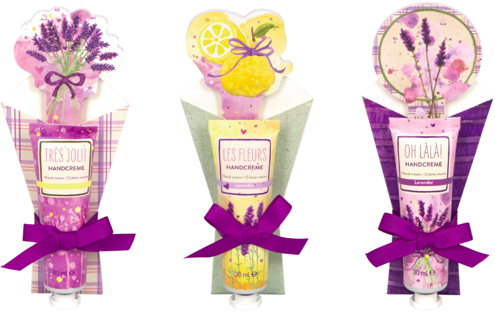 Drei bunte Handcremes in Verpackungen mit Blumenmotiven, lila Schleifen und Lavendelverzierungen.