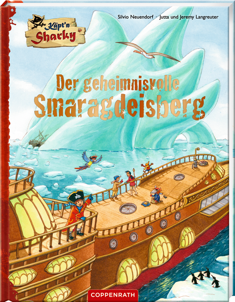 Käpt'n Sharky - Der geheimnisvolle Smaragdeisberg Piratenschiff segelt nahe riesigem Smaragd-Eisberg mit Pinguinen und Piraten, auf dem Buchcover von "Der geheimnisvolle Smaragdeisberg".