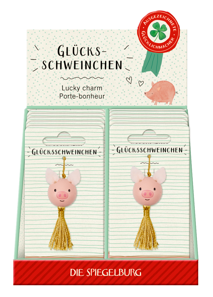 Mehrere Glücksschweinchen-Glücksbringer mit goldenen Quasten, präsentiert in einem Papp-Display.