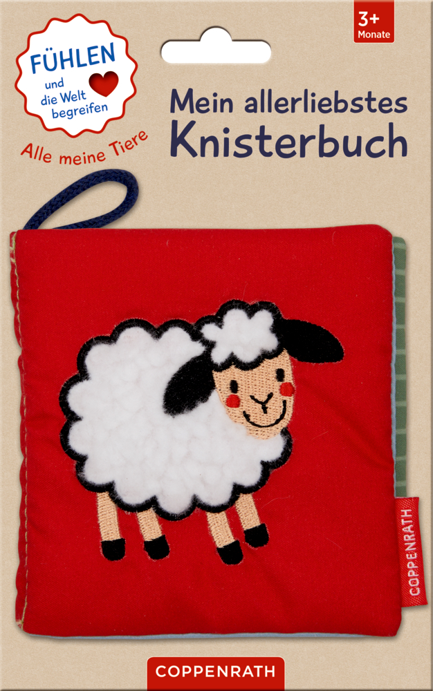 Rotes Stoffbuch mit Schlaufe und einem lächelnden Schaf auf dem Cover auf einer Display-Karte.
