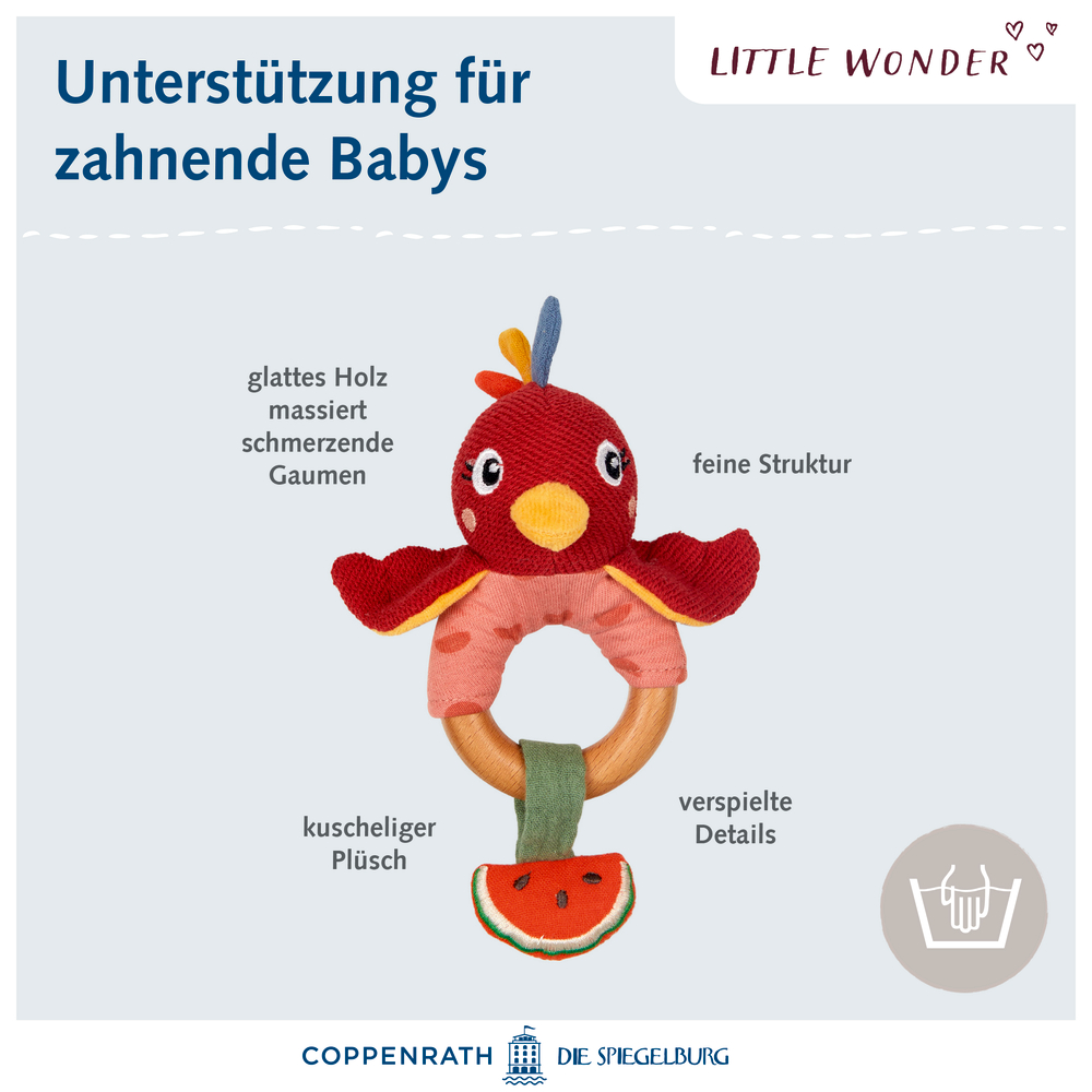 Beißring aus Holz mit Papageienkopf aus Stoff und Wassermelonen-Akzent.