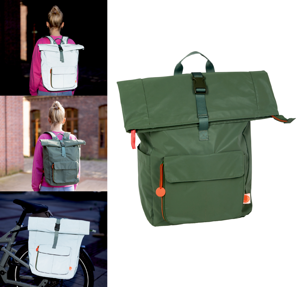Olivgrüner Rucksack mit orangenen Details bei Tag und reflektierend bei Nacht am Rücken einer Person dargestellt. 