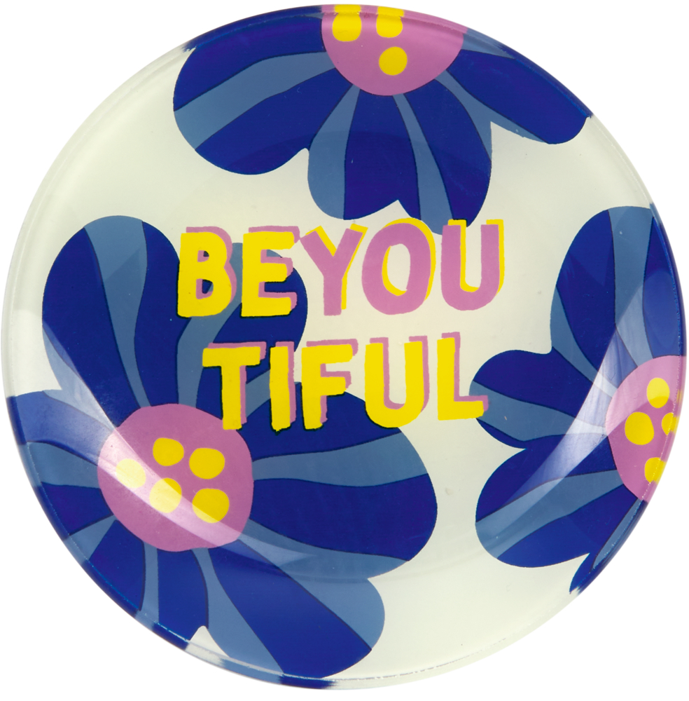Runder Teller mit blauen und lilafarbenen Blumen und dem Wort BEYOUTIFUL in gelben und pinken Buchstaben.