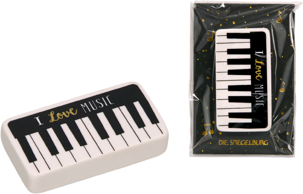 Rechteckiger Radiergummi mit Klaviertasten und Aufdruck I Love Music, einmal lose und einmal in Verpackung.