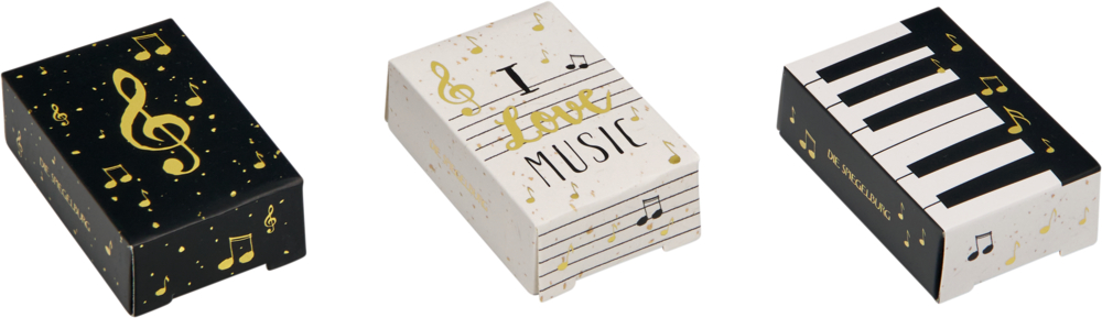 Drei kleine rechteckige Boxen mit Notensymbolen und Klaviertasten in Schwarz, Weiß und Gold.