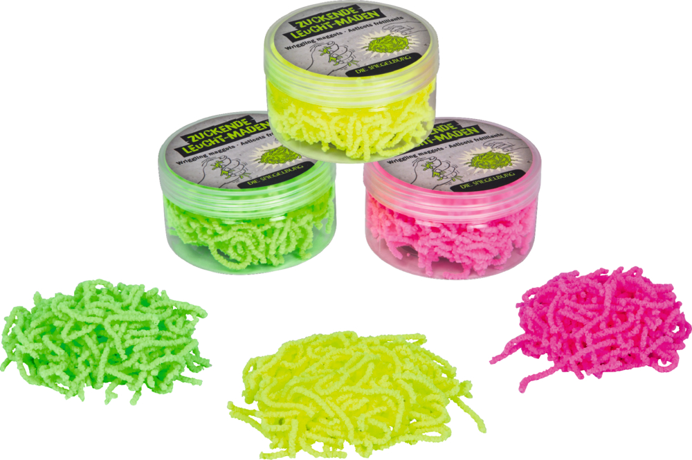 Drei transparente Kunststoffdosen mit künstlichen Maden in Grün, Gelb und Pink, ein Teil derselben Farben liegt lose davor.