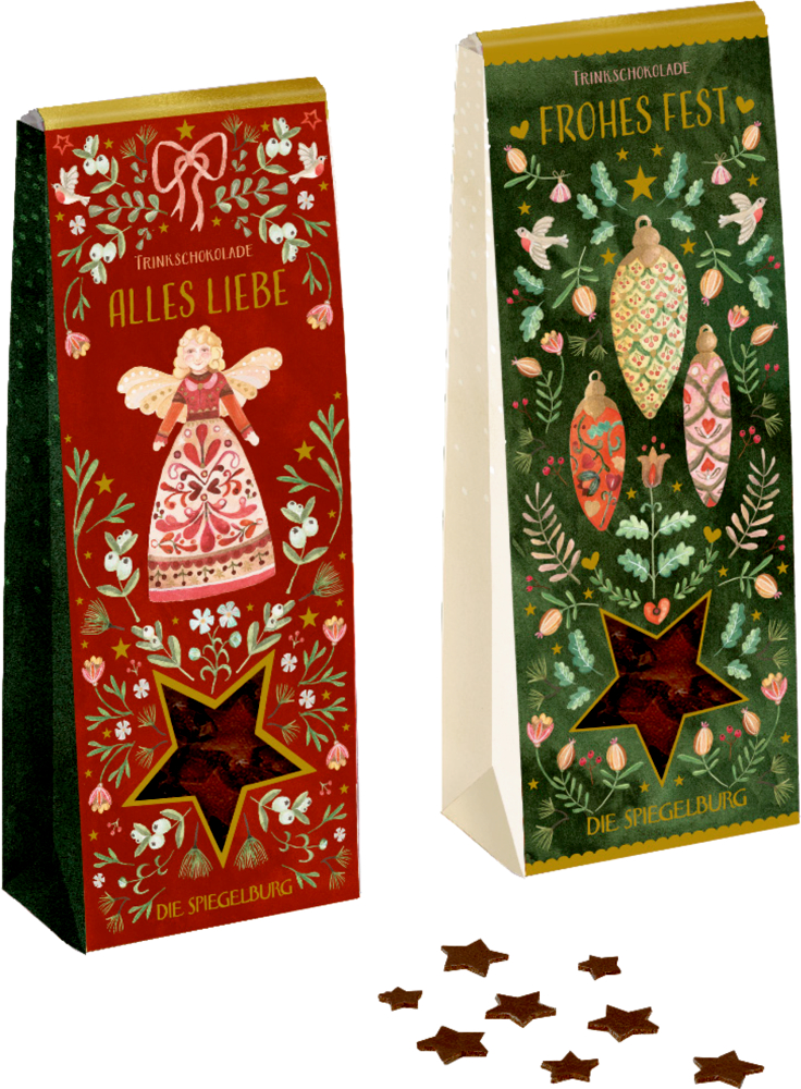 Zwei weihnachtliche Packungen mit Trinkschokolade mit festlichem Design und sternförmigen Fenstern auf der Vorderseite.