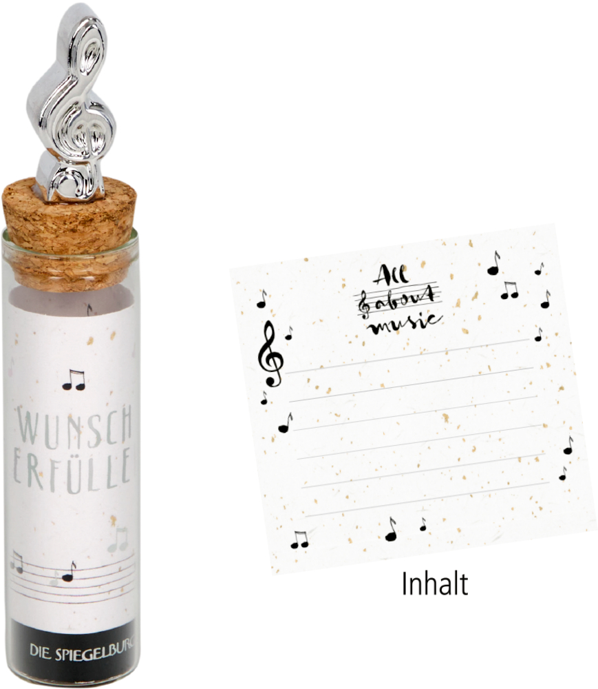 Ein Glasgefäß mit einem Violinschlüssel auf dem Deckel steht neben einer Notenkarte.