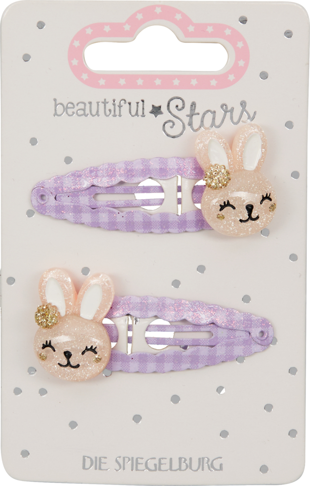 Zwei pinke, glitzernde Haarspangen mit Leopardenmuster und Hase auf einer Karte mit weißen Punkten.