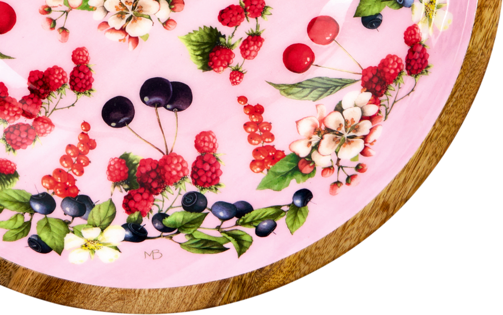 Detailansicht der Blumen- und Beerenverzierung einer Holzschale.