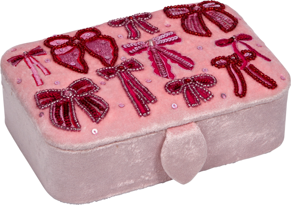 Rechteckige rosafarbene Schmuckschatulle mit bestickten roten und pinken Schleifen und Pailletten auf dem Deckel.