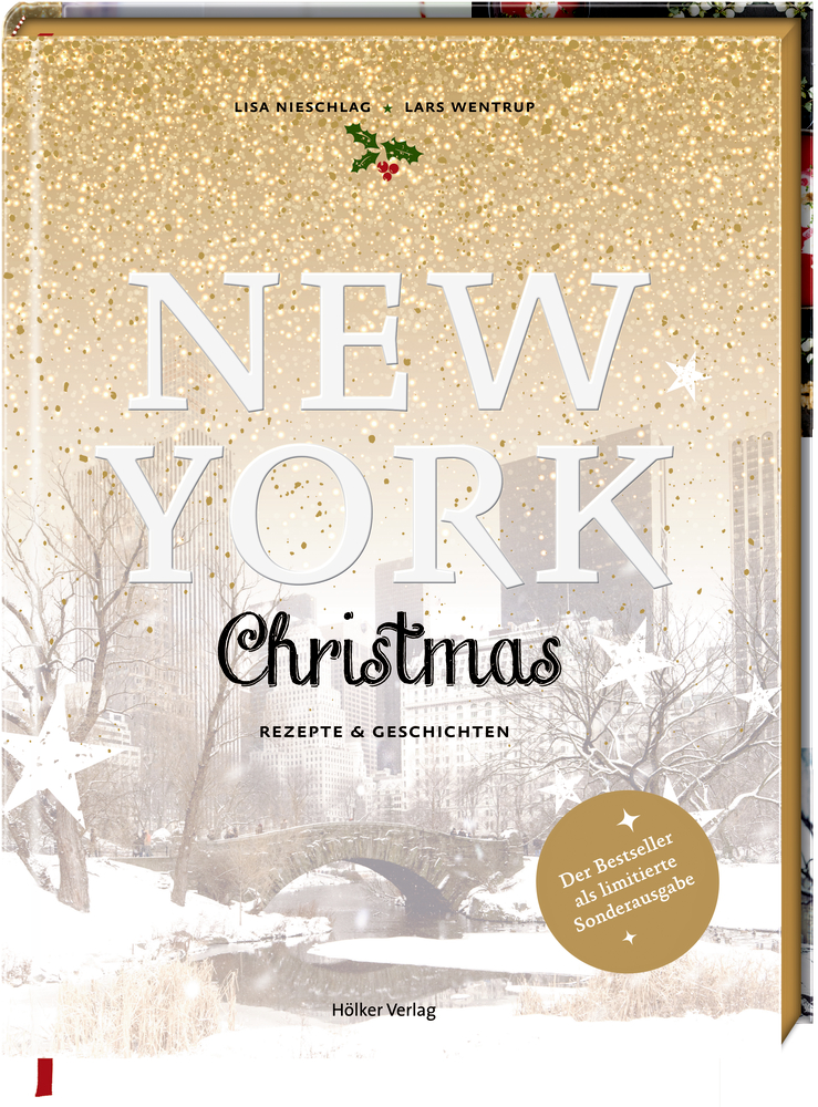 New York Christmas (Jubiläumsausgabe) - Rezepte & Geschichten Buchcover mit verschneitem Central Park in New York mit goldenen Sternen und festlicher Weihnachtsdekoration im Hintergrund.