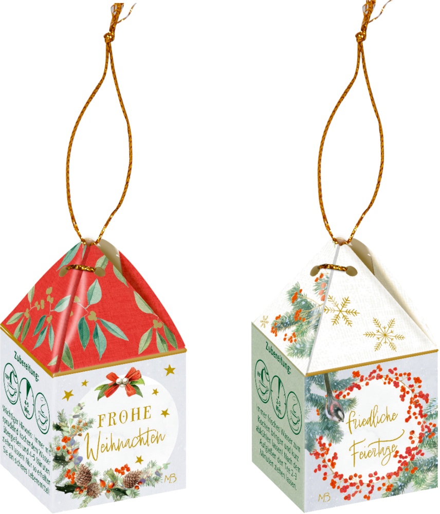 Zwei festliche, ornamentförmige Teeschachteln mit Weihnachtsgrüßen hängen an Goldfäden.
