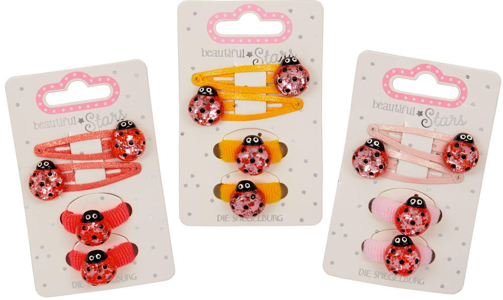Haarclips & -gummis Marienkäfer no.4 - beatiful Stars Drei Sets bunter Marienkäfer-Haarspangen und -bändern auf dekorativen Karten mit dem Wort „Stars“ in einer schönen Schriftart.