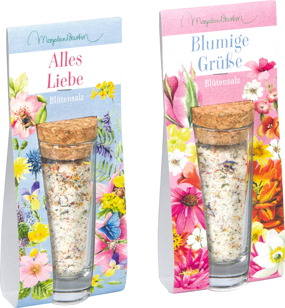 Zwei Glasfläschchen mit Blumensalz und Korkverschluss in Blumenverpackung mit Aufschrift.