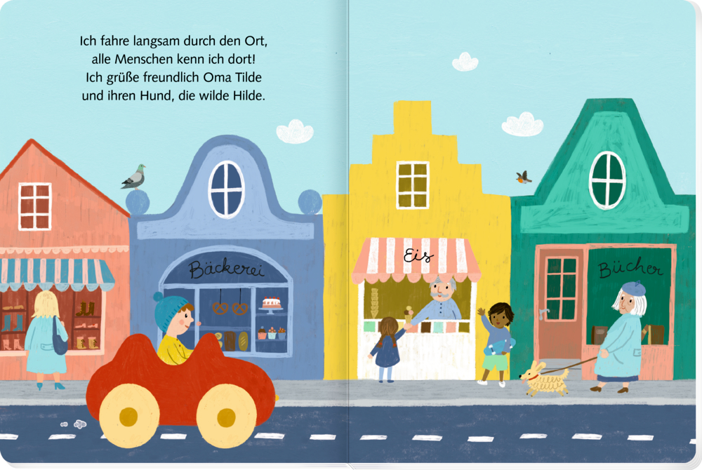 Bunte Geschäfte, Menschen, ein rotes Auto, ein Hund und Vögel unter einem blauen Himmel schaffen eine fröhliche Dorfszene, auf einer Doppelseite mit Text.