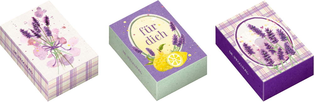 Drei dekorative Boxen mit Lavendelmotiven, eine mit Aufschrift für dich und Zitronen, alle mit lila Farbtönen.