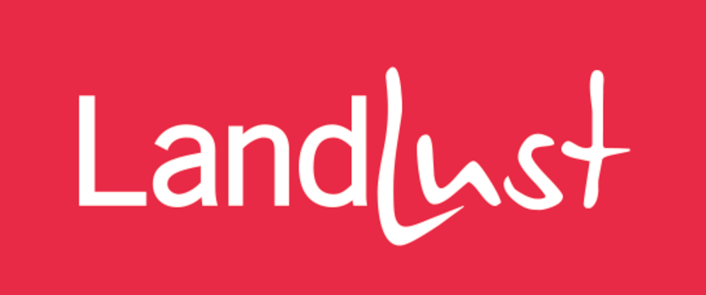 Weißer Text „Landlust“ auf rotem Hintergrund.