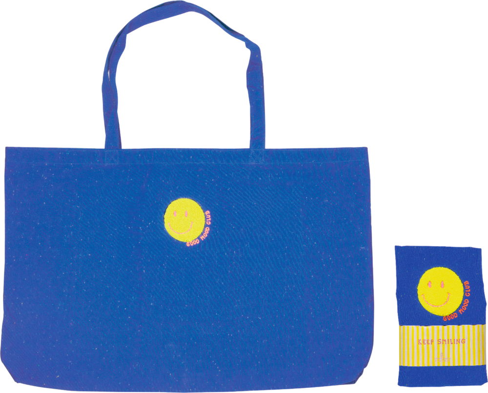 Blaue Tragetasche mit Henkeln, gelbem Smiley-Gesicht und Text, daneben passender gefalteter Beutel.
