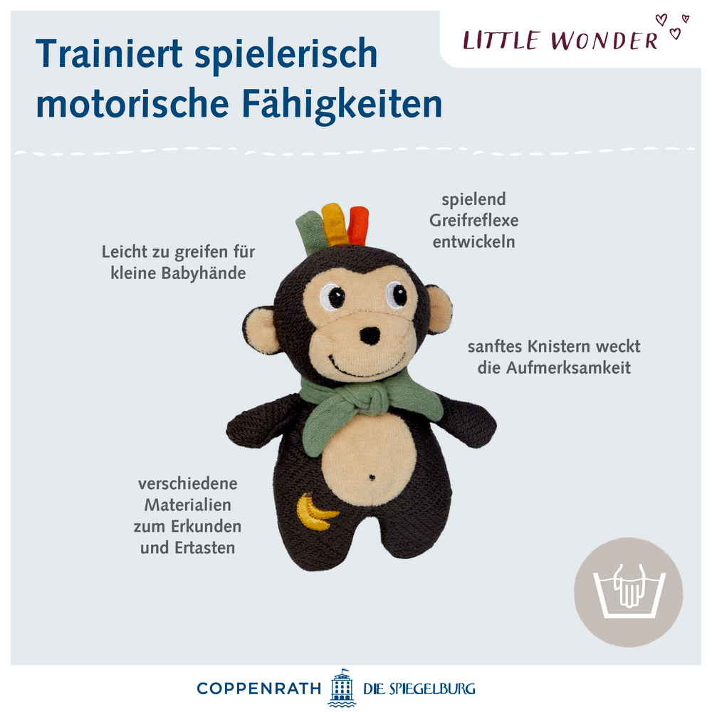 Plüschaffe mit bunten Details; Beschriftungen betonen die motorikfördernden Eigenschaften des Spielzeugs.