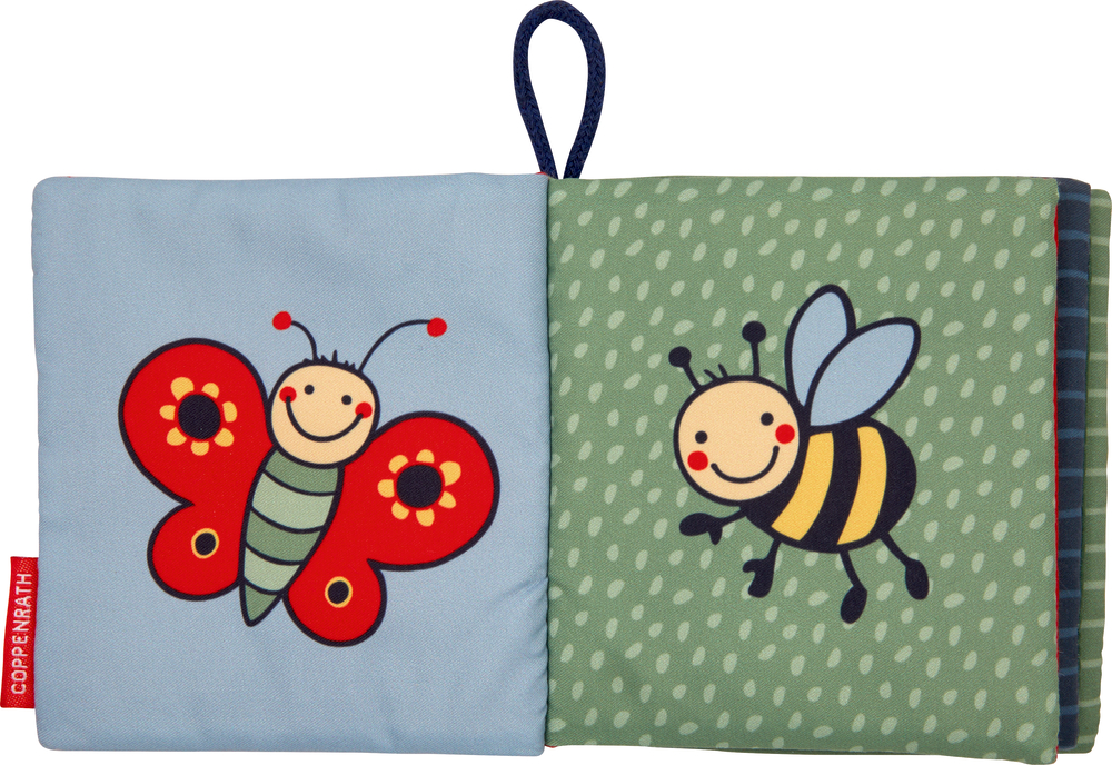 Stoffbuchseite mit einem lächelnden Schmetterling links und einer niedlichen Biene rechts.