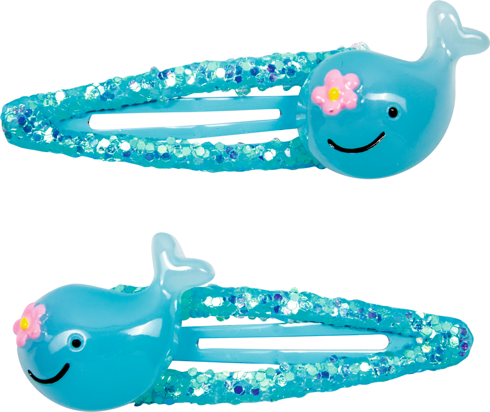 Zwei blaue Glitzer-Haarspangen mit lachenden Wal-Motiven und rosa Blumen auf den Köpfen.