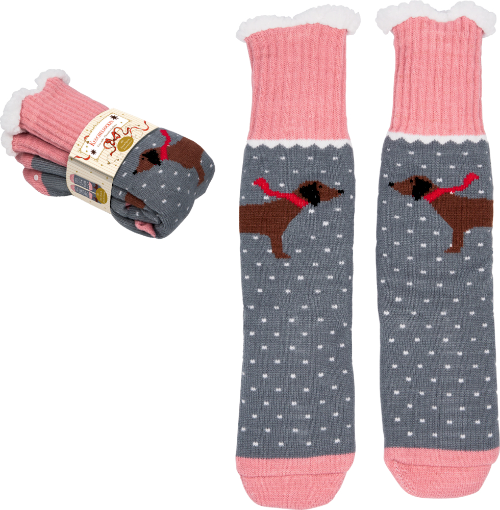 Graue Socken mit rosa Bündchen und Zehen, weißen Punkten und Dackel mit rotem Schal, daneben ein gefaltetes Paar mit Banderole.