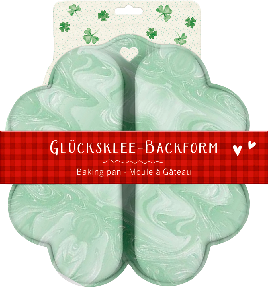 Glücksklee-Backform aus Silikon - Viel Glück Kleeblattförmige Backform mit roter Papierbanderole.
