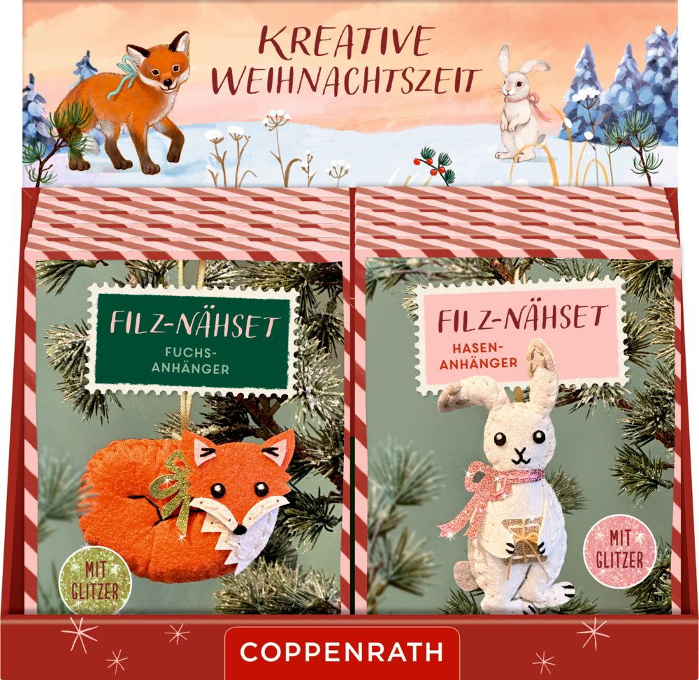 Thekenaufsteller mit Weihnachtsbastelsets: Fuchs-Anhänger (links) und Hasen-Anhänger (rechts), beide mit festlicher Dekoration.