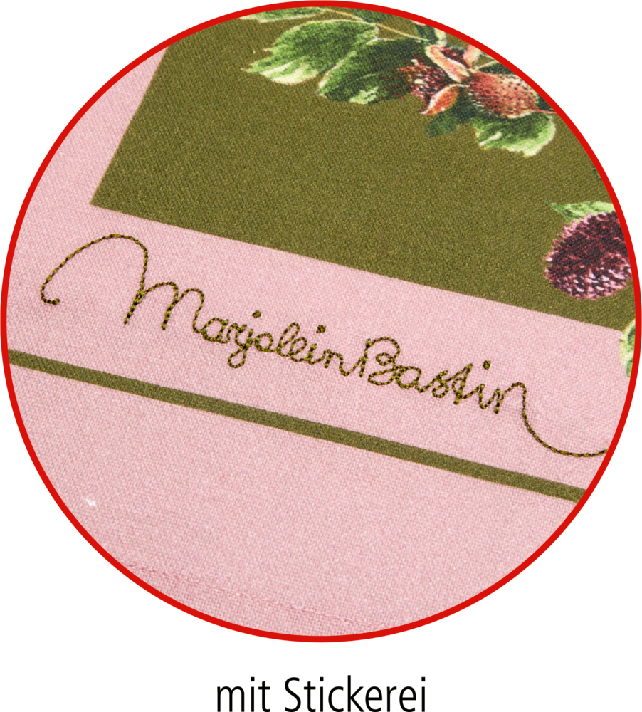 Nahaufnahme des Stoffes von Marjolein Bastin mit einem Blumenmuster in Rosa und Grün und ihrer Unterschrift.