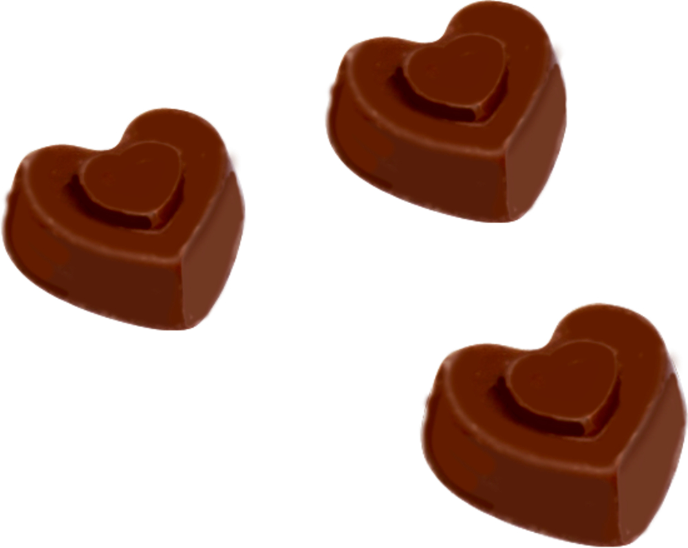 Drei herzförmige Stückchen aus brauner Schokolade auf weißem Hintergrund.
