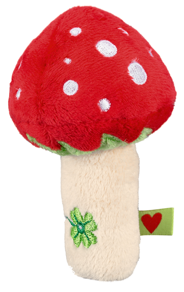 Glückspilzrassel BabyGlück Plüschiger rot-weißer Fliegenpilz mit cremefarbenem Stiel, grünem Kleeblatt und einem grünen Etikett mit einem roten Herz.