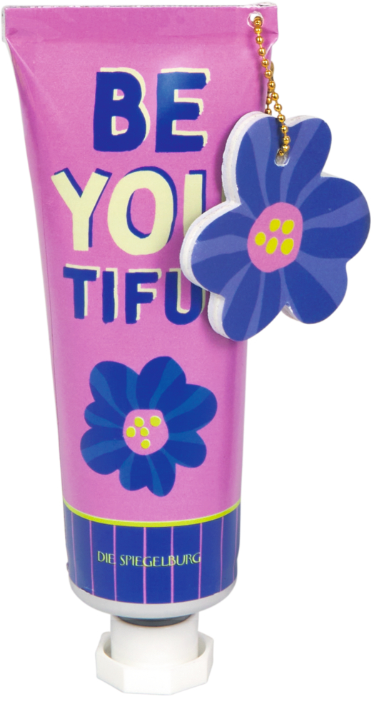 Eine rosa Tube mit der Aufschrift BE YOU TIFUL. Am Deckel ist ein blauer Blumenanhänger befestigt.