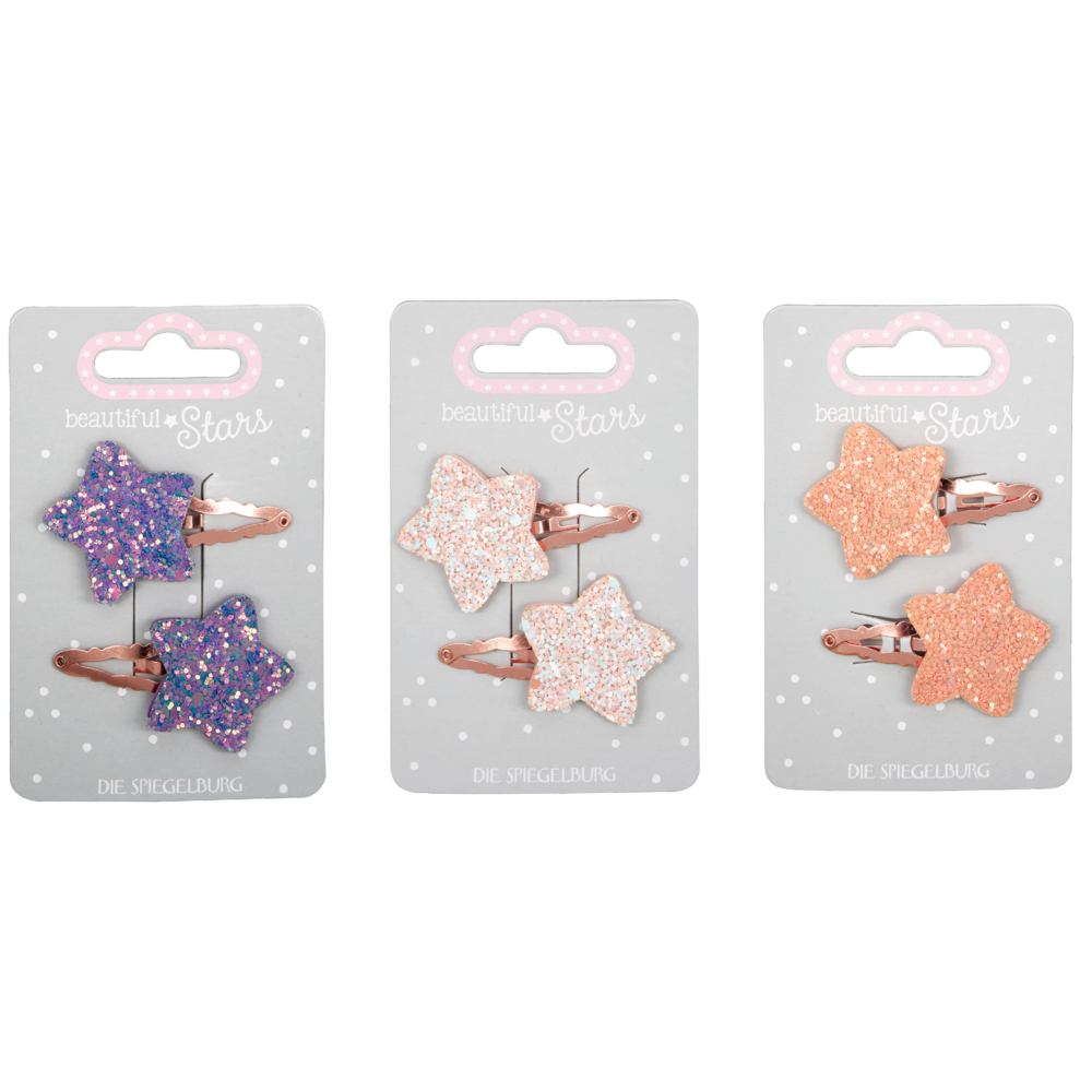 Drei graue, gepunktete Displaykarten, jede mit zwei glitzernden Haarspangen in Sternform – lila, roségold und apricot –.