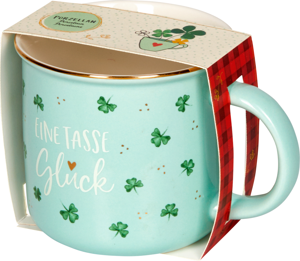 Porzellan-Tasse Glücksklee - Viel Glück Hellblaue Tasse mit grünen Kleeblättern mit einer Pappbanderole.