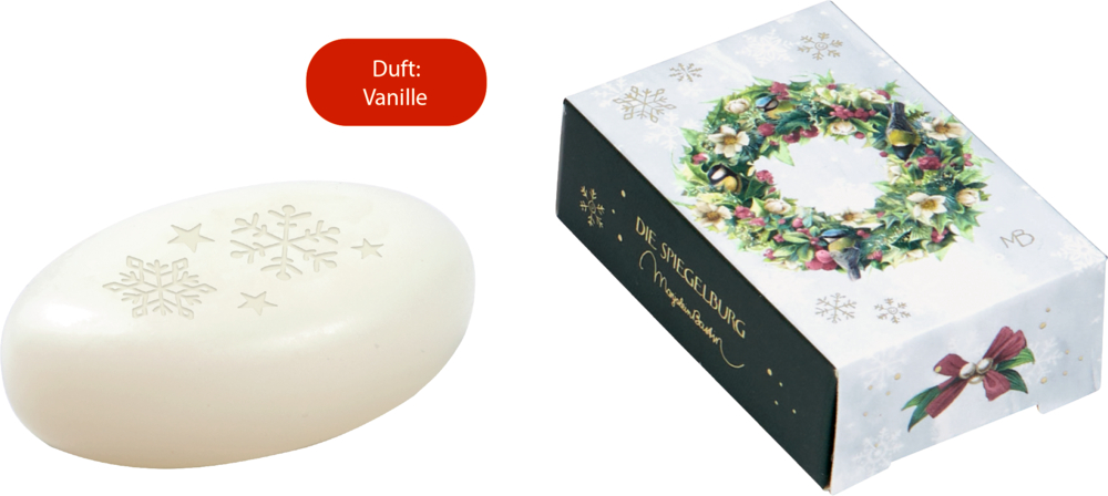 Weiße Seife mit Schneeflockenmotiv und Geschenkverpackung mit grünem Kranzdekor, Duft Vanille.