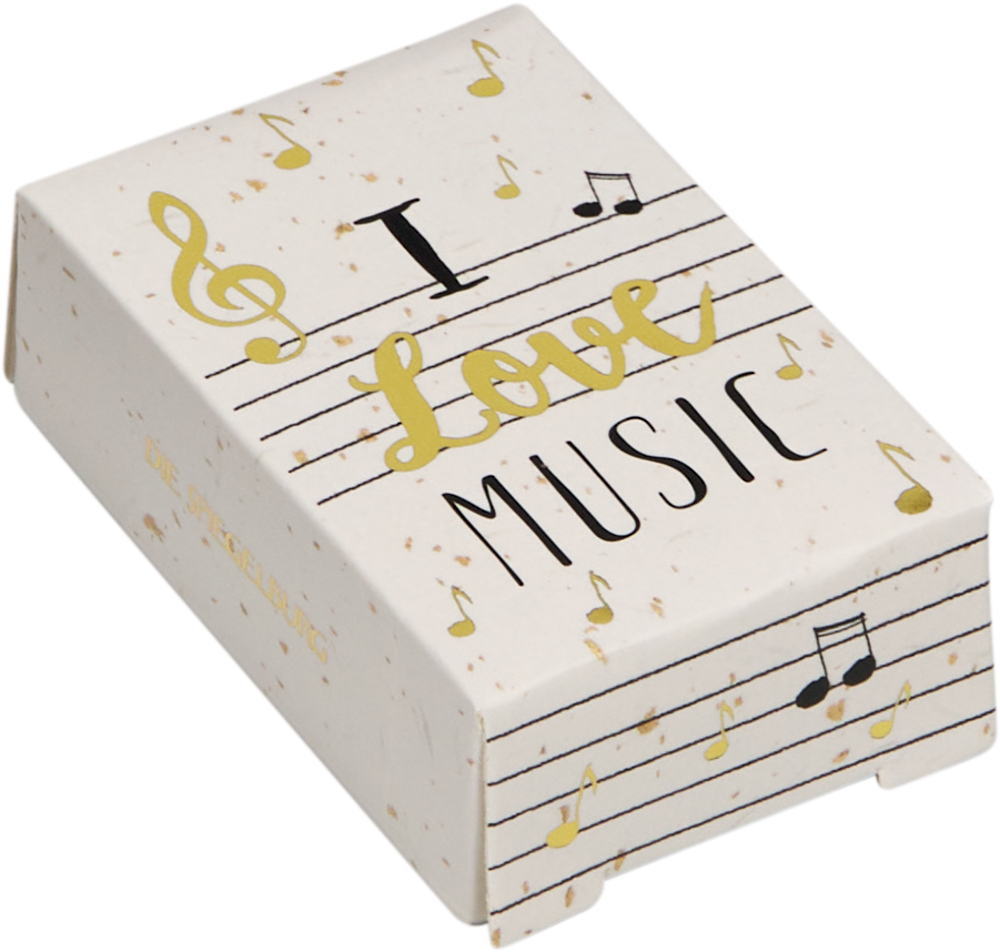 Eine Box mit Noten und dem Schriftzug I Love Music in schwarzen und goldenen Buchstaben.