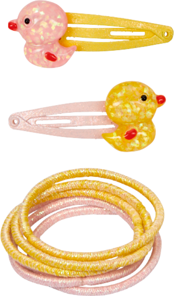 Es werden entenförmige Spangen und gelb-rosa glitzernde Haargummis präsentiert.